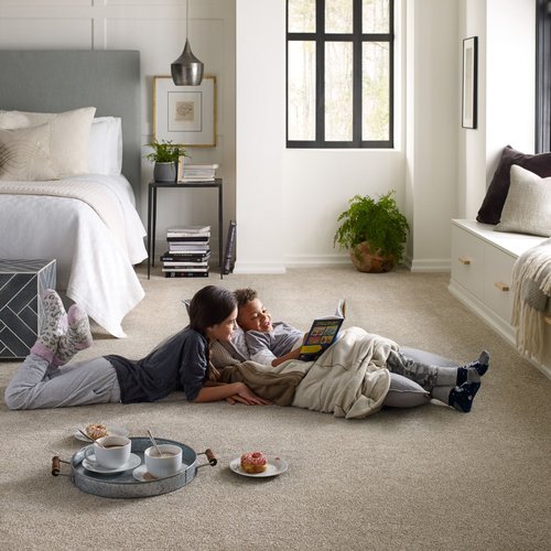 Kids reading on the carpet floor from Roedigers Custom Flooring in Celina, OH